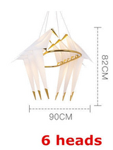 Lampe suspendue cage à oiseaux : luminaire élégant