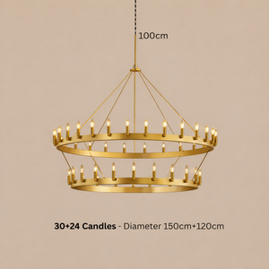 Gold chandelier with candles on a beige background