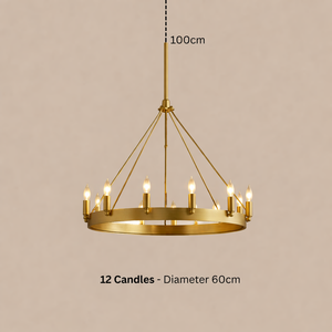 Gold chandelier with 12 candle-like lights on a beige background
