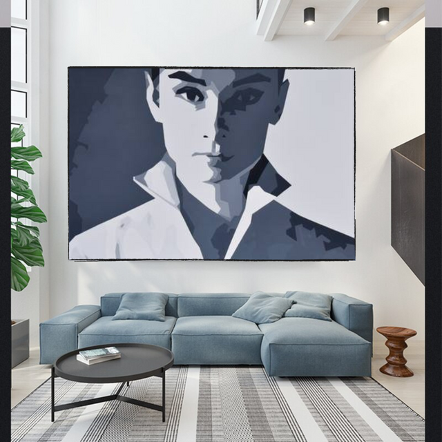 a living room with a large painting on the wall